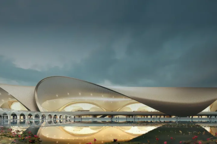Banner image showing Navi Mumbai International Airport terminal design with modern architectural structure and landscape, released by Adani Airports.