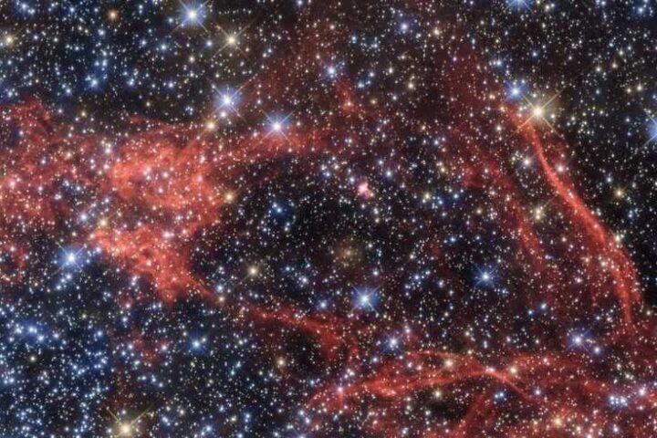 A dense field of stars and gas clouds in a galaxy. (Public Domain)