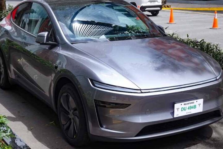 Front three-quarter view of a 2025 Tesla Model Y in Quicksilver at Tesla’s Flagship Store, Uptown BGC.