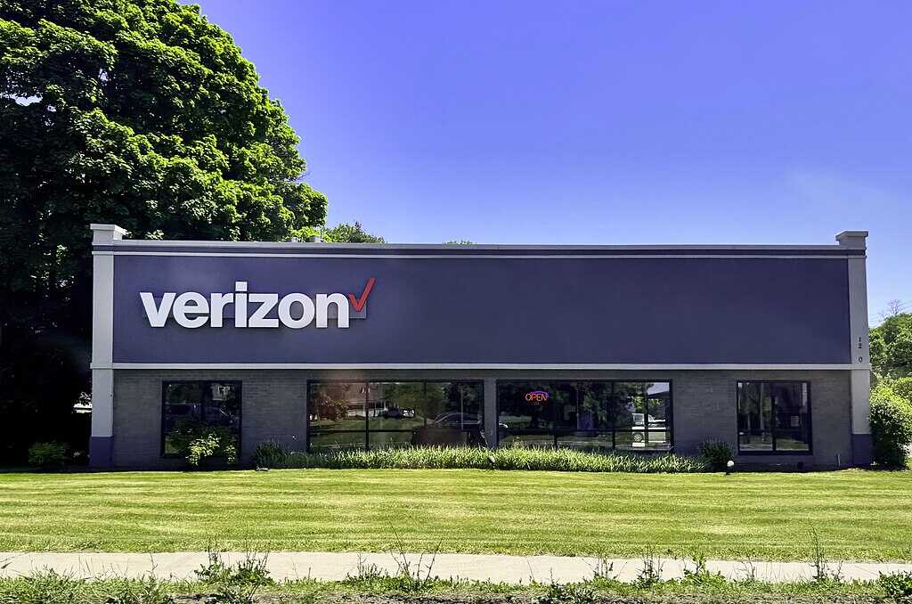 Modern Verizon retail store with signage and storefront at dusk