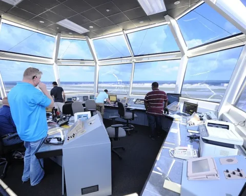 Pope Field air traffic control tower photographed from ground level; U.S. Air Force image by Tech. Sgt. Michael Holzworth, Public Domain.