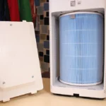 Xiaomi Smart Air Purifier 2S cylindrical filter displayed on a wooden floor, photographed for open-source documentation.