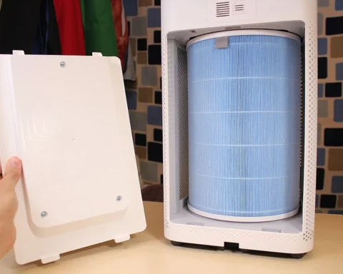 Xiaomi Smart Air Purifier 2S cylindrical filter displayed on a wooden floor, photographed for open-source documentation.