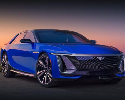 Cadillac Celestiq front three-quarter view near modern architecture at sunset