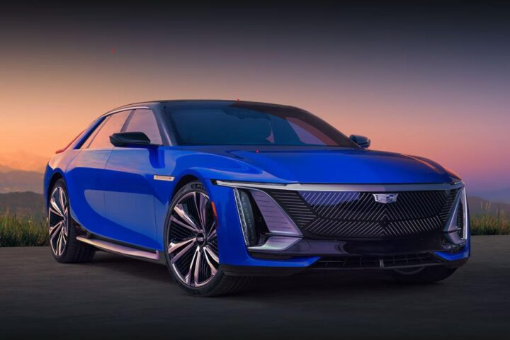 Cadillac Celestiq front three-quarter view near modern architecture at sunset
