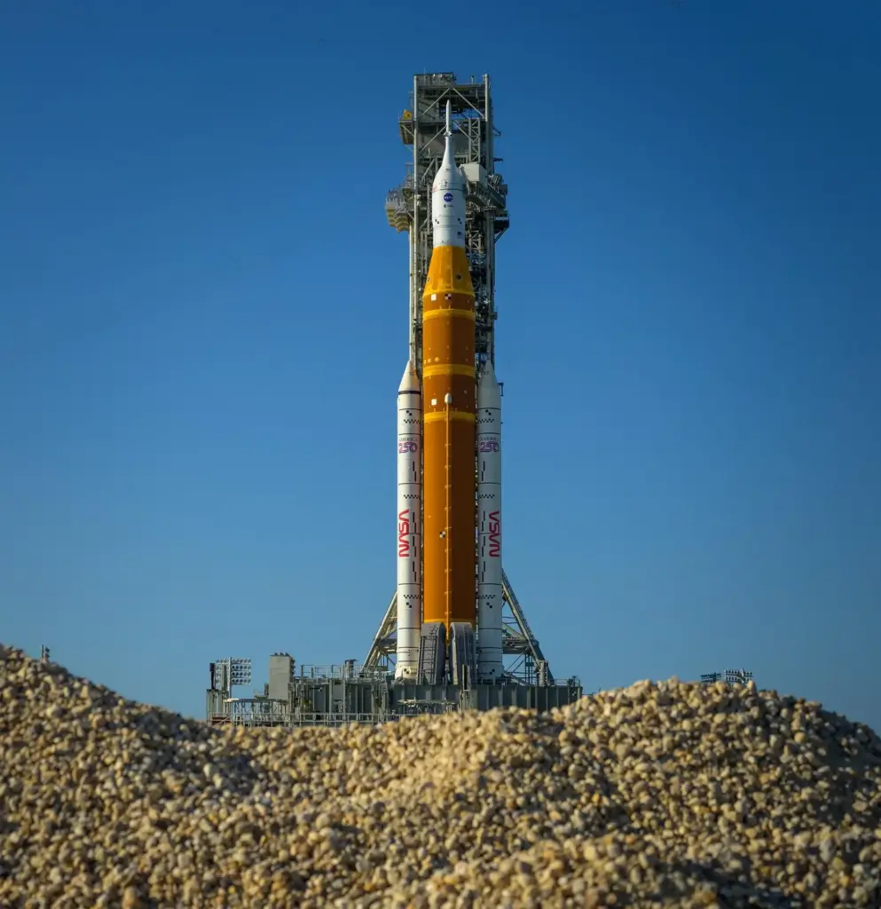 Artemis II Space Launch System rocket and Orion spacecraft on a mobile launcher at Launch Complex 39B at Kennedy Space Center.
