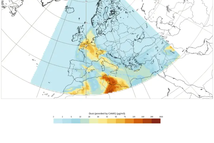 Forecast map from Copernicus CAMS showing Saharan dust plume moving from North Africa across Spain toward the UK with colour scale indicating dust concentration levels.