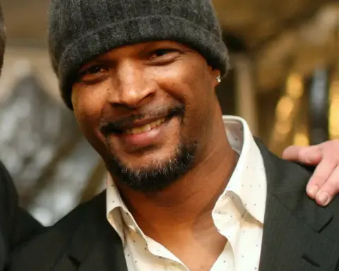 Damon Wayans Sr. smiling in a casual outfit, highlighting his role in raising awareness about diabetes-related vision loss and eye health