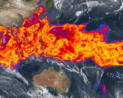 Satellite image showing a massive 10,000-kilometer-long continuous monsoon cloud band stretching from India across the Himalayas, China, and the Korean Peninsula to South Korea, with dense cloud cover blanketing central, northern and eastern India.