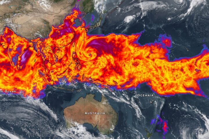 Satellite image showing a massive 10,000-kilometer-long continuous monsoon cloud band stretching from India across the Himalayas, China, and the Korean Peninsula to South Korea, with dense cloud cover blanketing central, northern and eastern India.