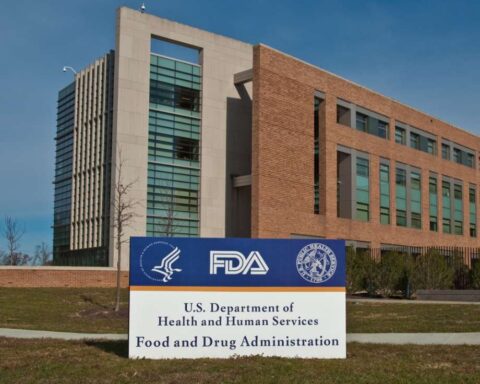 Exterior view of the FDA headquarters campus in Silver Spring, Maryland, featuring the agency's sign and Building 21 in the background.