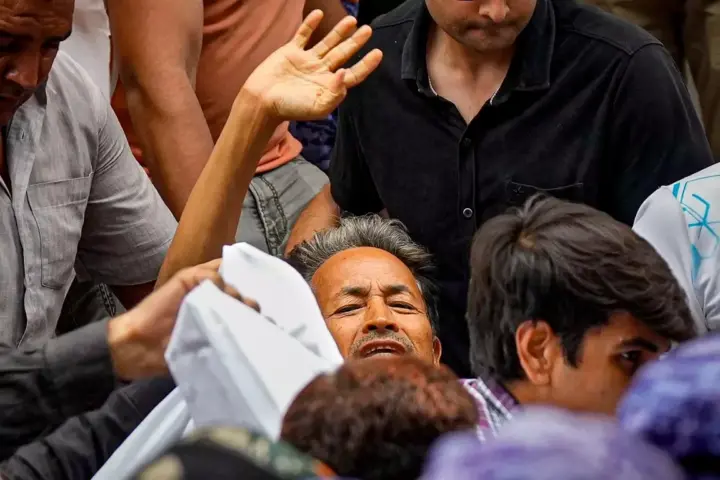 Sonam Wangchuk being transported by supporters during a CJP protest, showing the physical intensity of his activism for Ladakh's Sixth Schedule demand