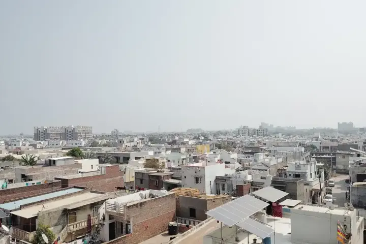 Rooftop solar panels installed on homes in Mehsana, Gujarat.