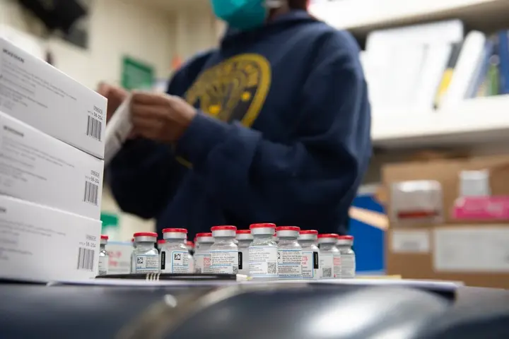 Vaccine vials prepared for administration.