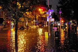 A flooded Manhattan street at night during Hurricane Sandy, 2012.