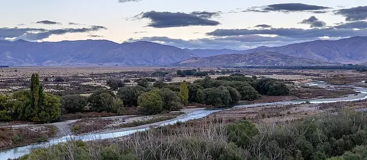 Ahuriri River flowing through Canterbury, New Zealand at sunrise.