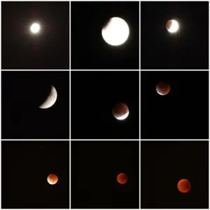 Partially eclipsed Moon glowing red-orange during a lunar eclipse.