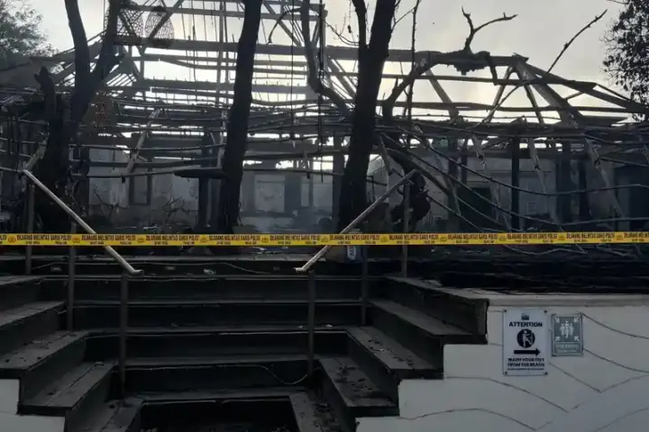 Charred ruins of Chez Gado Gado restaurant in Seminyak, Bali after fire