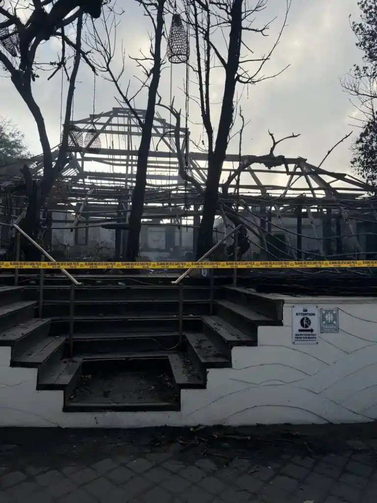 Charred ruins of Chez Gado Gado restaurant in Seminyak, Bali after fire