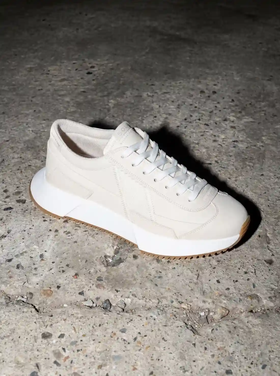 Close view of circular-economy footwear material used in compostable sneakers.
