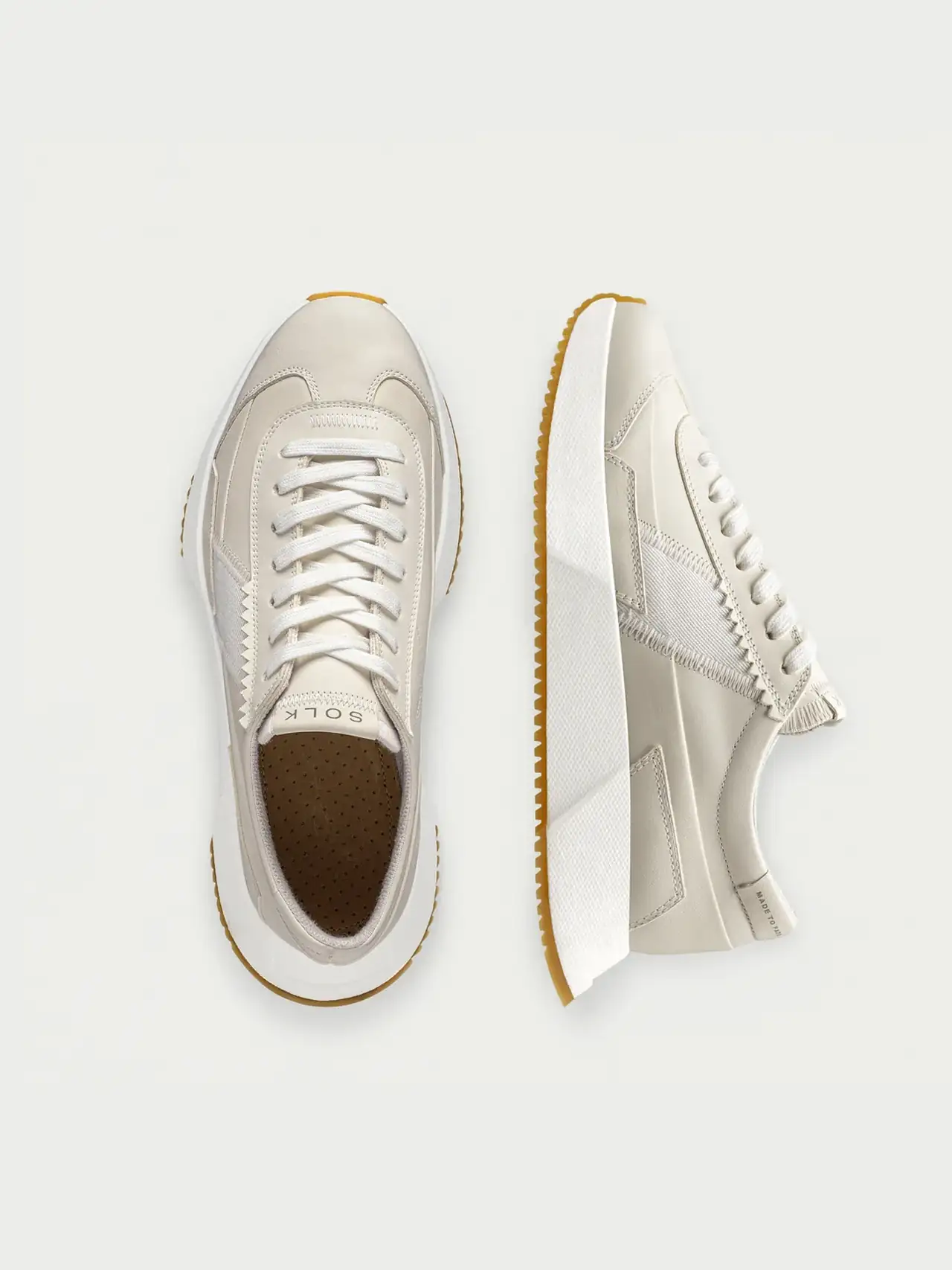 Detail of a compostable sneaker highlighting biodegradable construction.