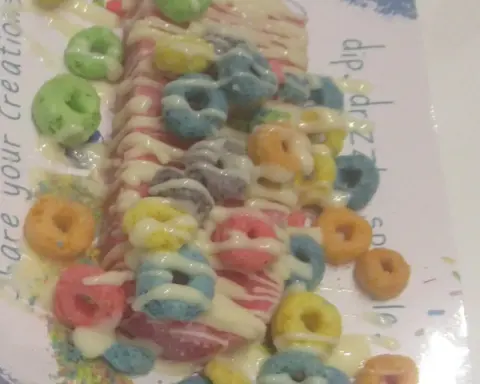 A frozen fruit bar on a stick with colorful toppings, representing the kind of frozen treat covered by the recall.