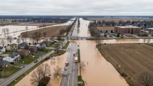 Aerial view of flooded streets and farmland in Indiana during the August 2026 White River flooding