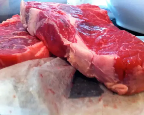Raw beef cuts on a surface representing the recalled Argentine shipment