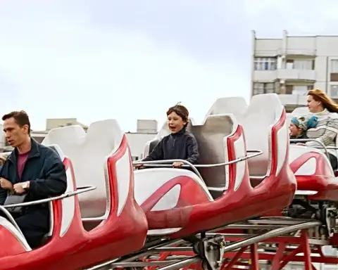 Riders on a roller coaster during operation