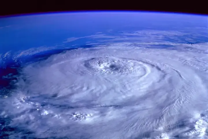 Satellite image of Hurricane Lala swirling over the Pacific Ocean with cloud bands spiraling around the center