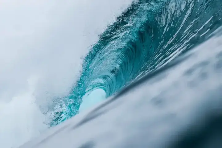 Ocean waves crashing against a rocky shoreline