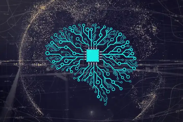Photograph of a computer chip mounted on a representation of an artificial neural network, illustrating AI computing hardware.
