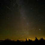 Perseids meteor shower peaks with up to 100 meteors per hour under rare new moon darkness; NASA streams live watch party
