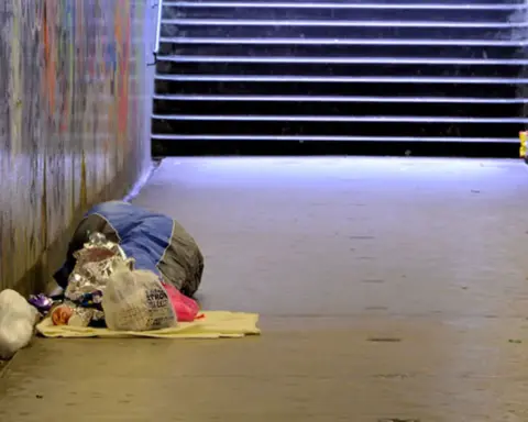 A person sleeping rough on a street in Belfast
