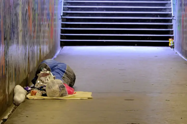 A person sleeping rough on a street in Belfast