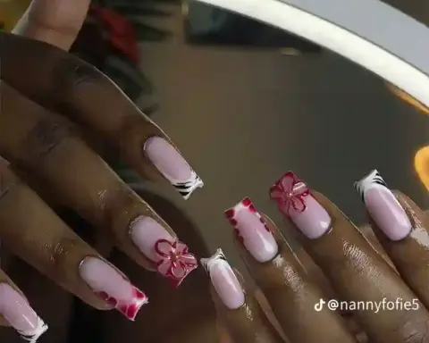 Gel nail polish being applied on fingernails