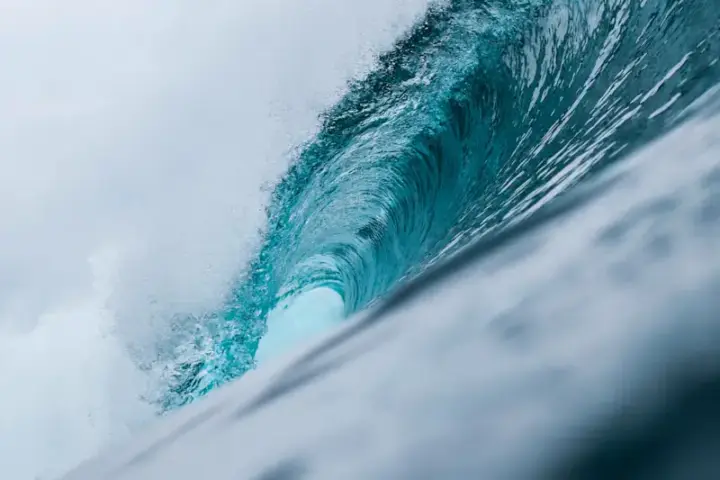 Ocean waves crashing against a rocky shoreline