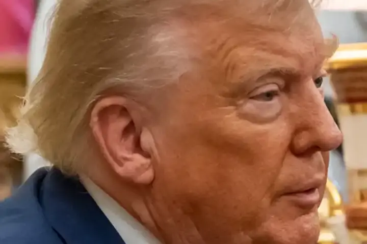 Portrait photograph of Donald Trump in the Oval Office, taken August 25, 2025, during a bilateral meeting with South Korean President Lee Jae-myung.