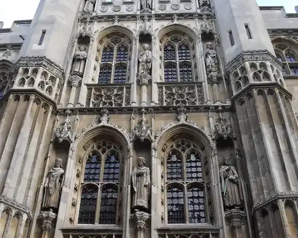 The historic Old Schools building complex at the University of Cambridge, with distinctive medieval stone architecture and arched windows