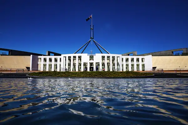 Australian Parliament House with national flag flying