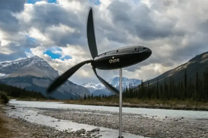 A compact wind turbine generating renewable power on rural land