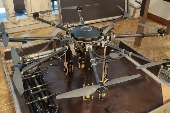 A large eight-rotor Ukrainian military heavy-lift drone stored inside an open transport case.