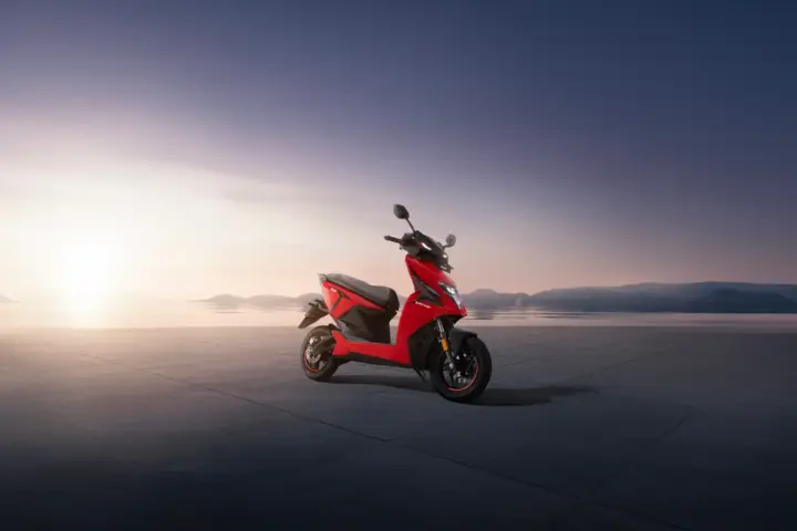 Red Simple Energy electric scooter parked outdoors