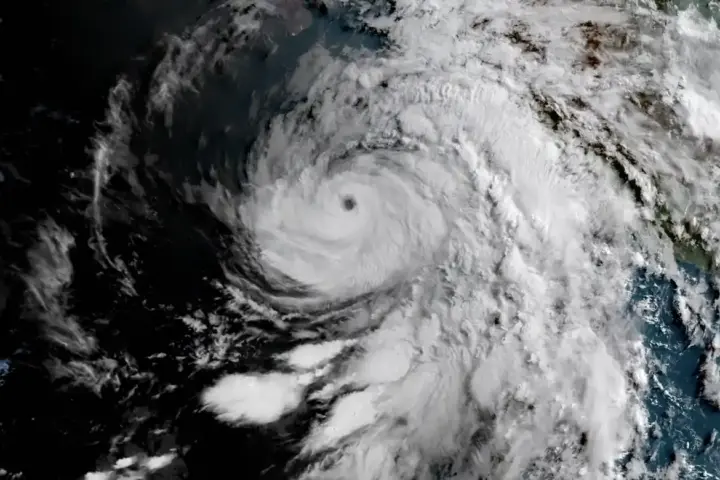 High-resolution geostationary satellite view of cloud formations and atmospheric circulation over the ocean.