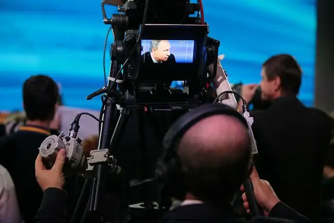 Professional television studio camera on production floor for broadcast and streaming channel operations