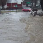 Floodwater covers a roadway in eastern New York during a previous nor’easter.