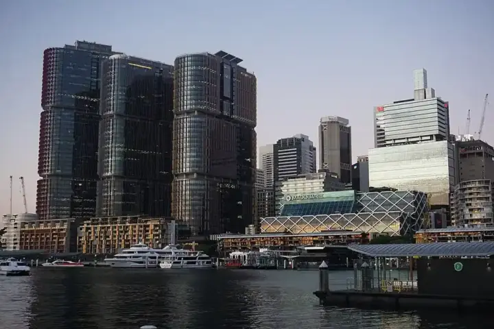 Exterior view of modern commercial office towers in Barangaroo, Sydney, housing major corporate professional firms.