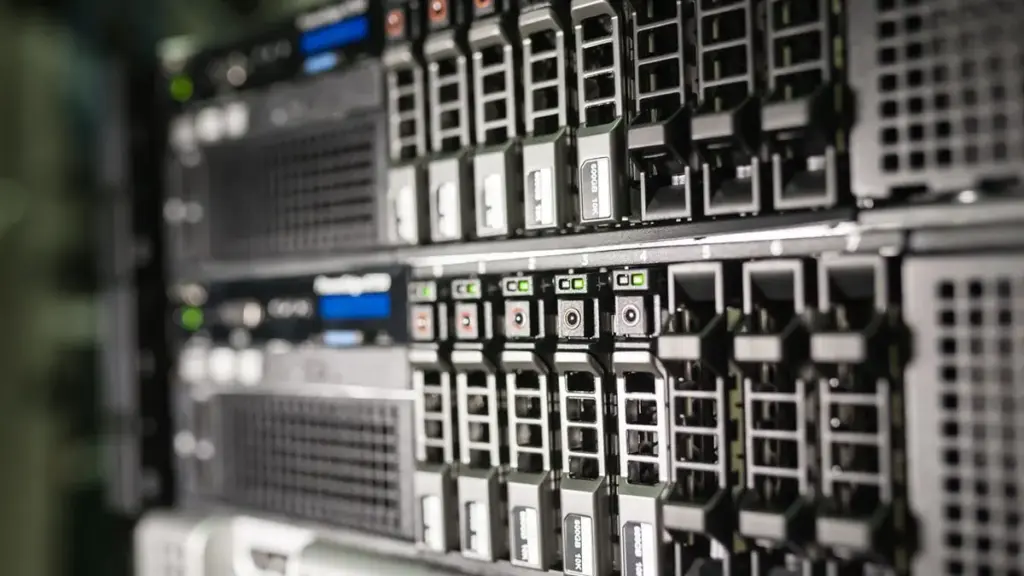 Server equipment arranged in a rack in a data center environment.