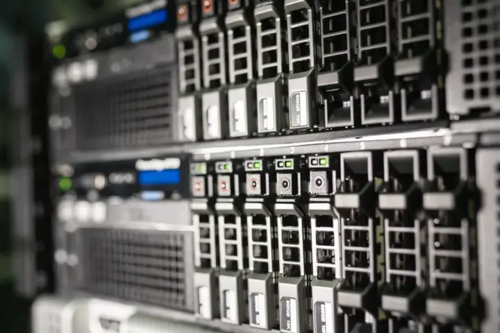 Server equipment arranged in a rack in a data center environment.
