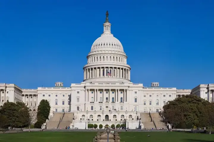 Full view of the United States Capitol west front and dome on Capitol Hill in Washington DC